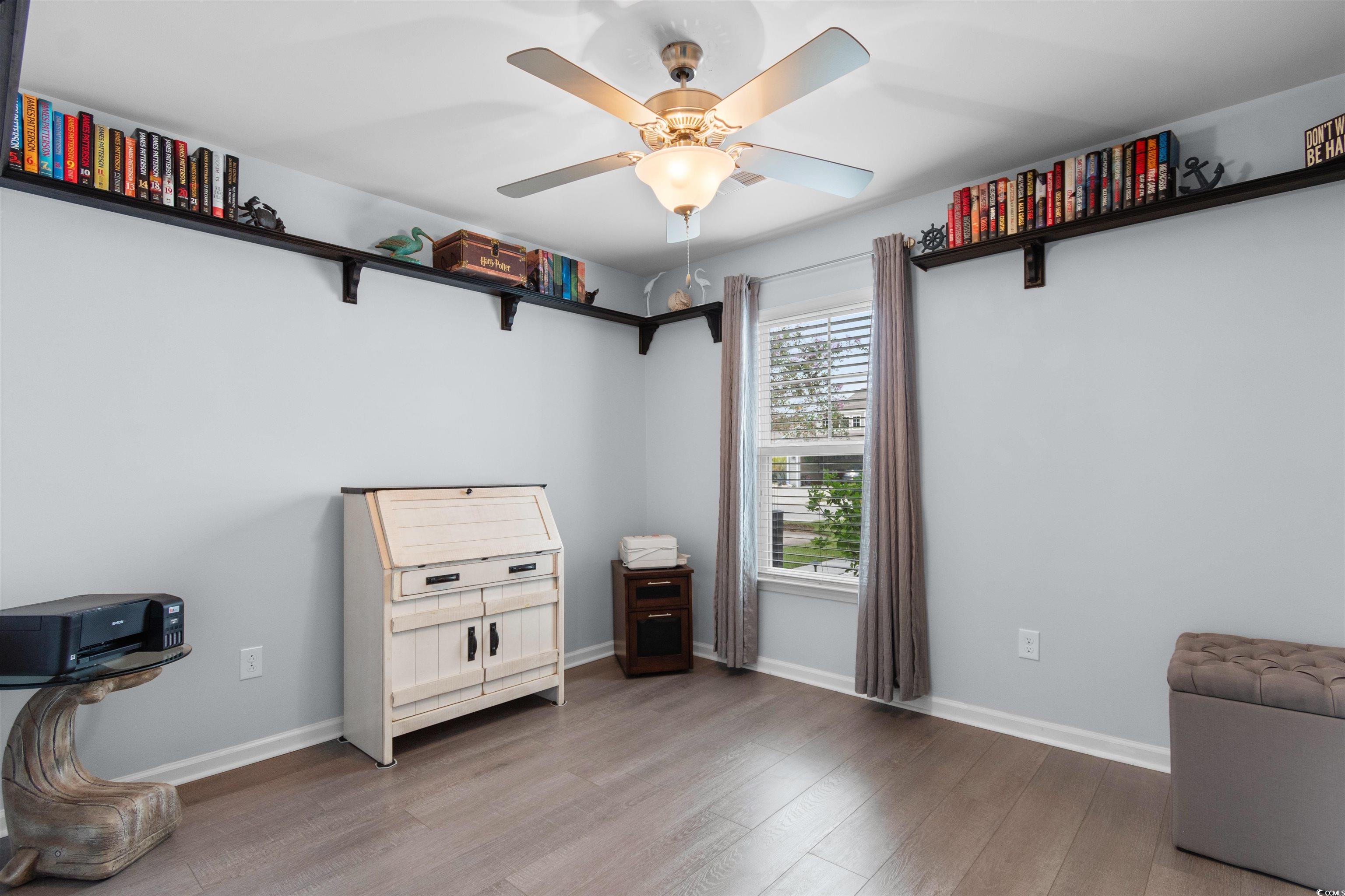 4380 Livorn Loop, Unit 4380 Myrtle Beach, SC 29579 - Photo 20 of 33 Bedroom featuring light wood-style flooring, a ceiling fan, and a closet