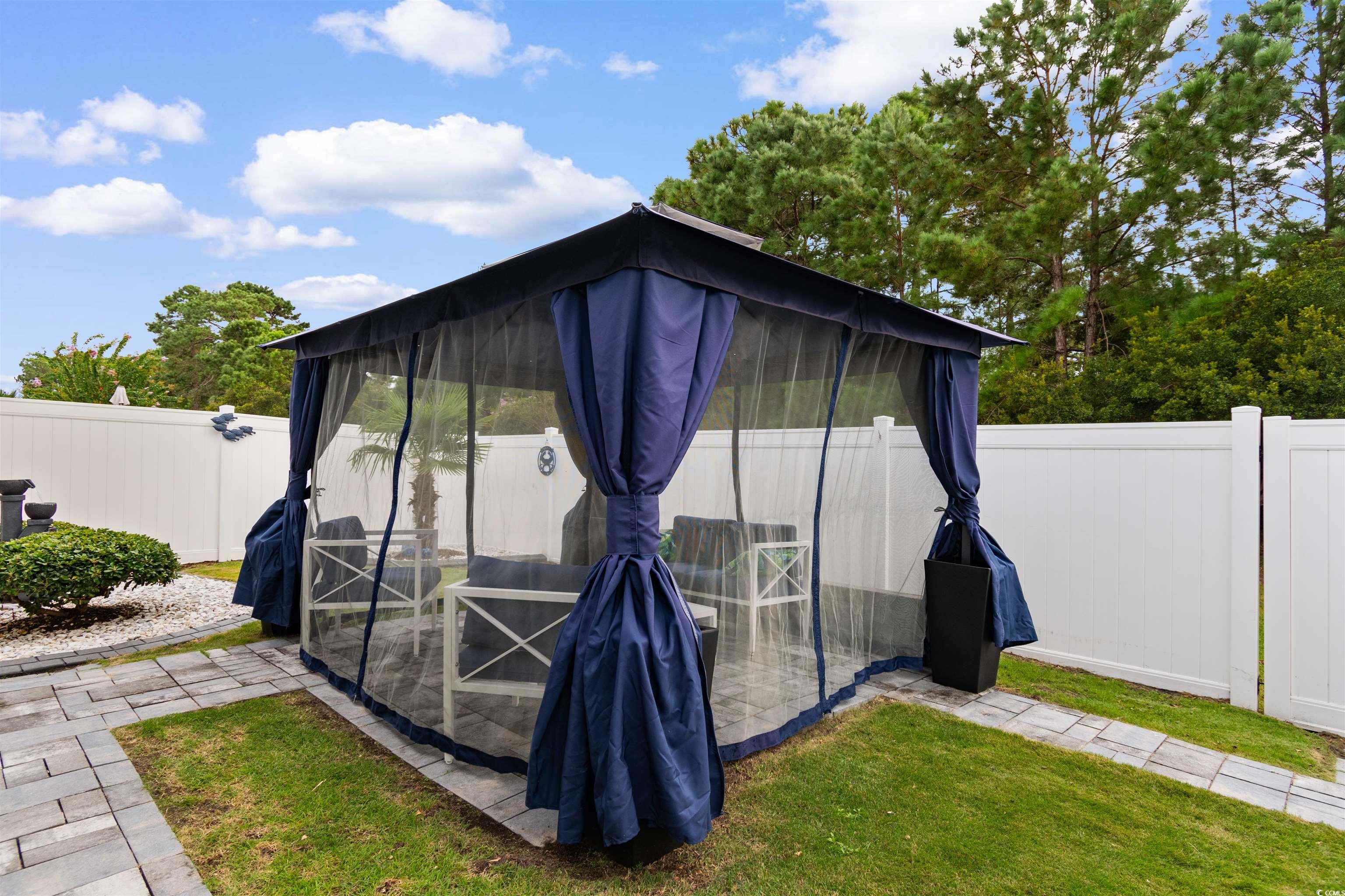4380 Livorn Loop, Unit 4380 Myrtle Beach, SC 29579 - Photo 26 of 33 Sunroom / solarium with outdoor lounge area, plenty of natural light, and a ceiling fan