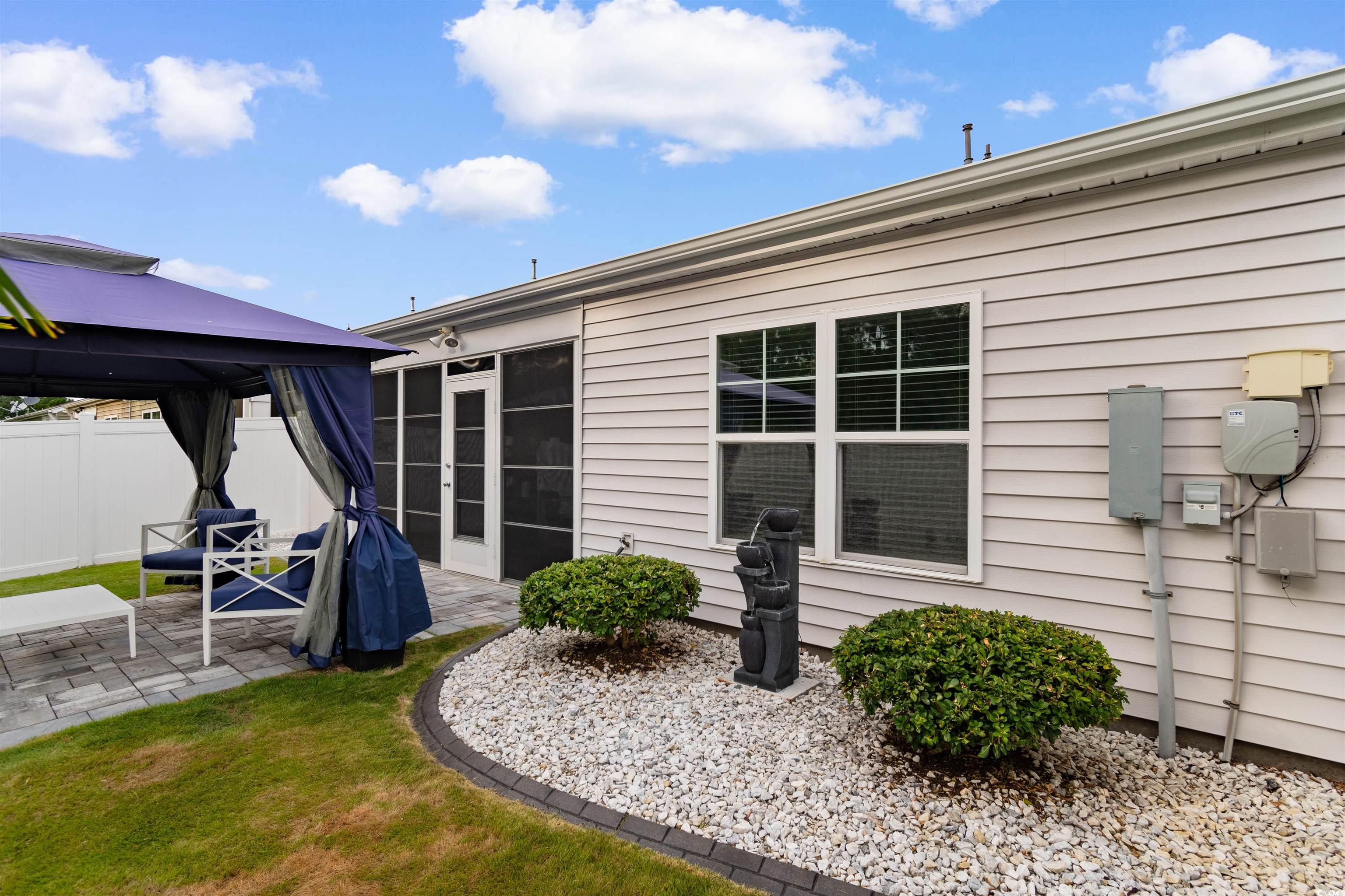 4380 Livorn Loop, Unit 4380 Myrtle Beach, SC 29579 - Photo 28 of 33 View of patio / terrace with a gazebo and a grill