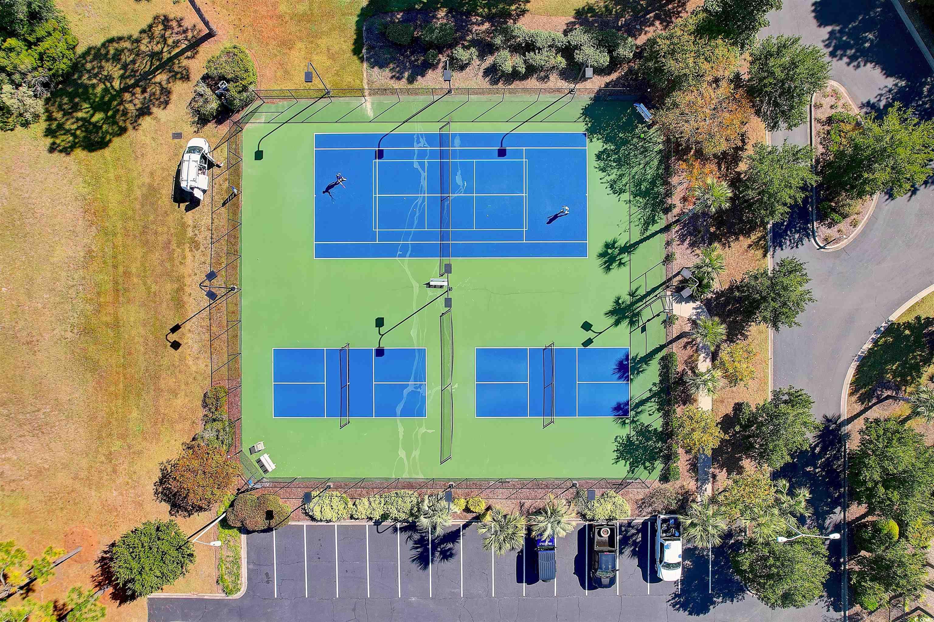 4380 Livorn Loop, Unit 4380 Myrtle Beach, SC 29579 - Photo 29 of 33 View of outdoor structure featuring a fenced backyard and a sunroom
