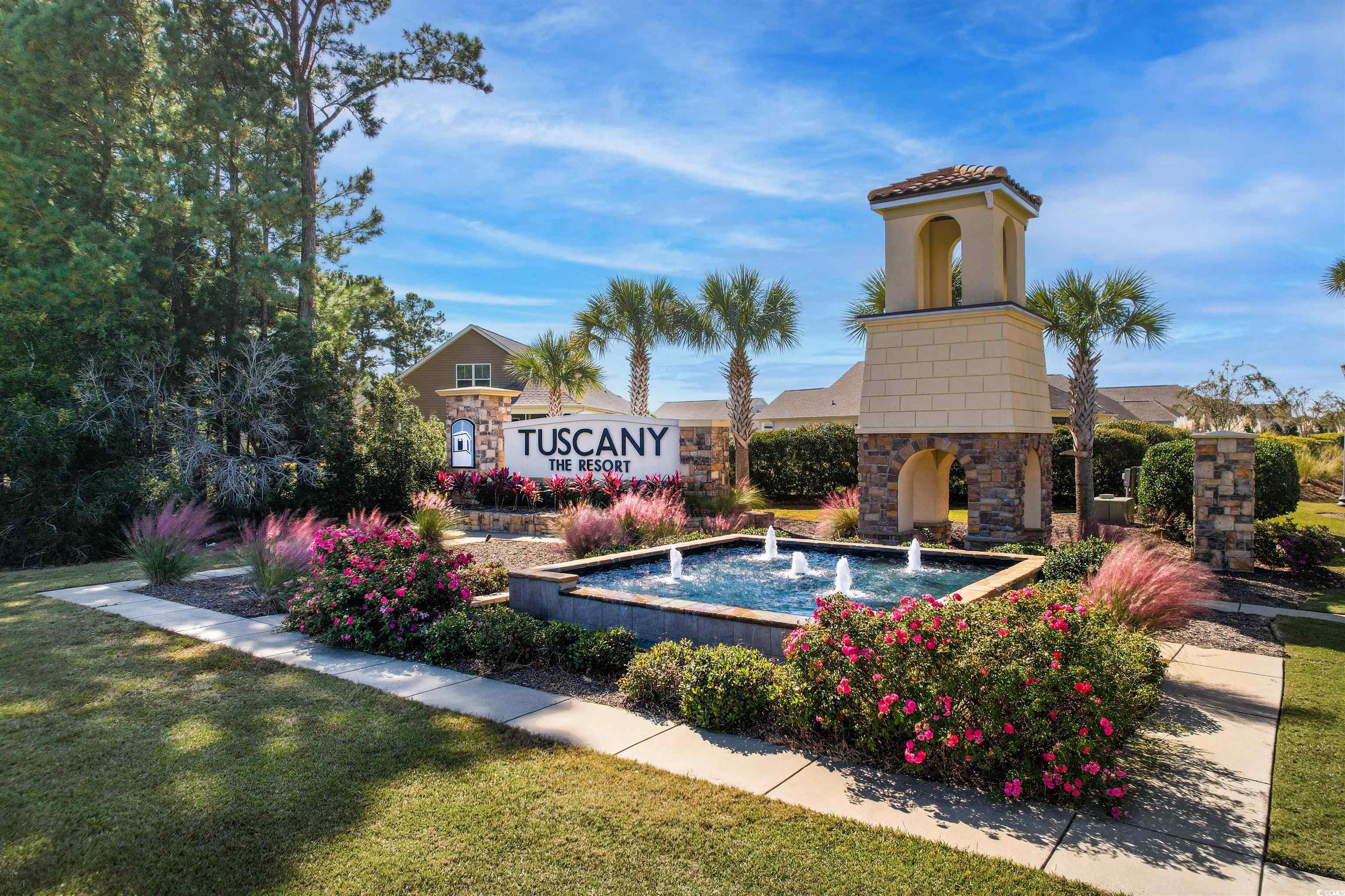 4380 Livorn Loop, Unit 4380 Myrtle Beach, SC 29579 - Photo 30 of 33 Back of property with an outdoor hangout area, a patio area, a sunroom, and a gazebo
