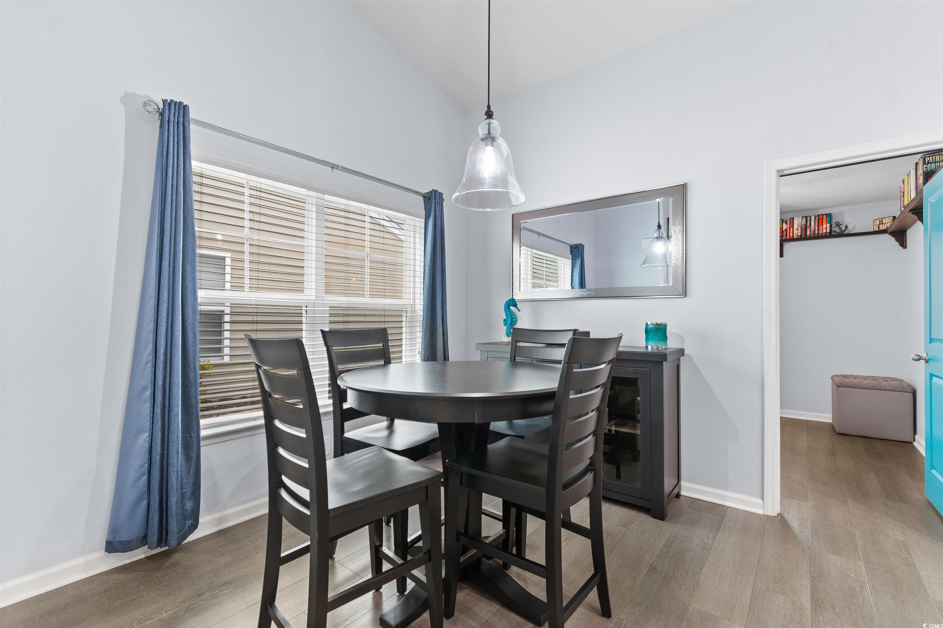 4380 Livorn Loop, Unit 4380 Myrtle Beach, SC 29579 - Photo 9 of 33 Kitchen with stainless steel refrigerator with ice dispenser, gas range oven, black microwave, tasteful backsplash, and dark stone counters