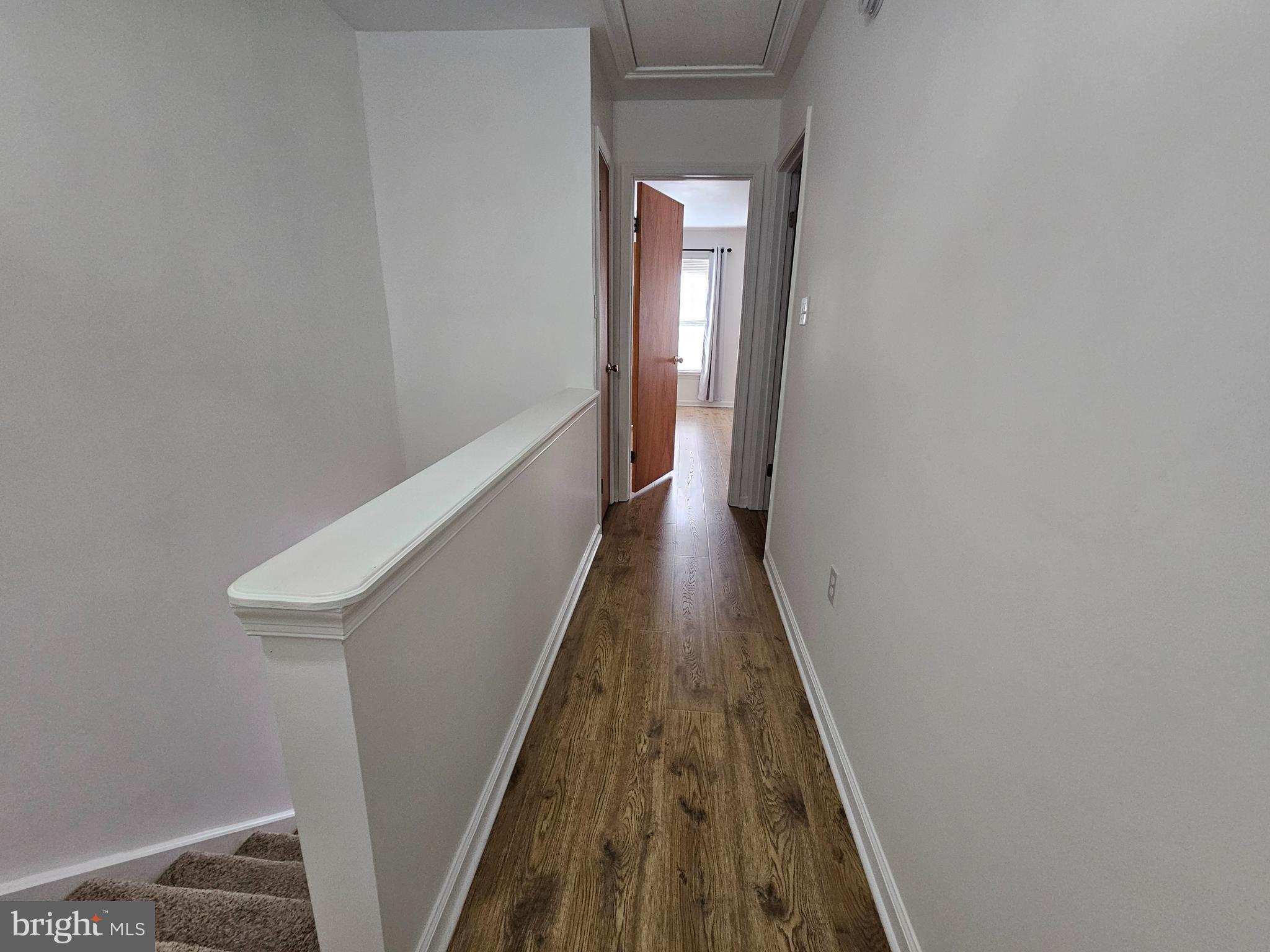 5 Thyme Street Elkton, MD 21921 - Photo 9 of 24 a view of a hallway with wooden floor and entryway