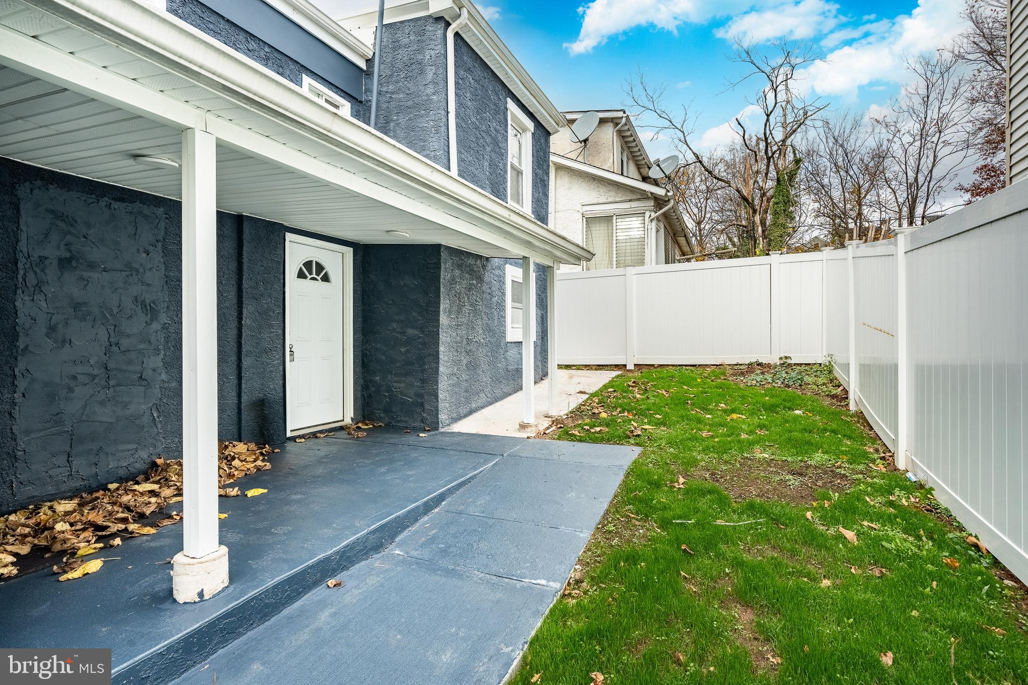 703 Walnut Street Pottstown, PA 19464 - Photo 24 of 24 a backyard of a house with lots of green space