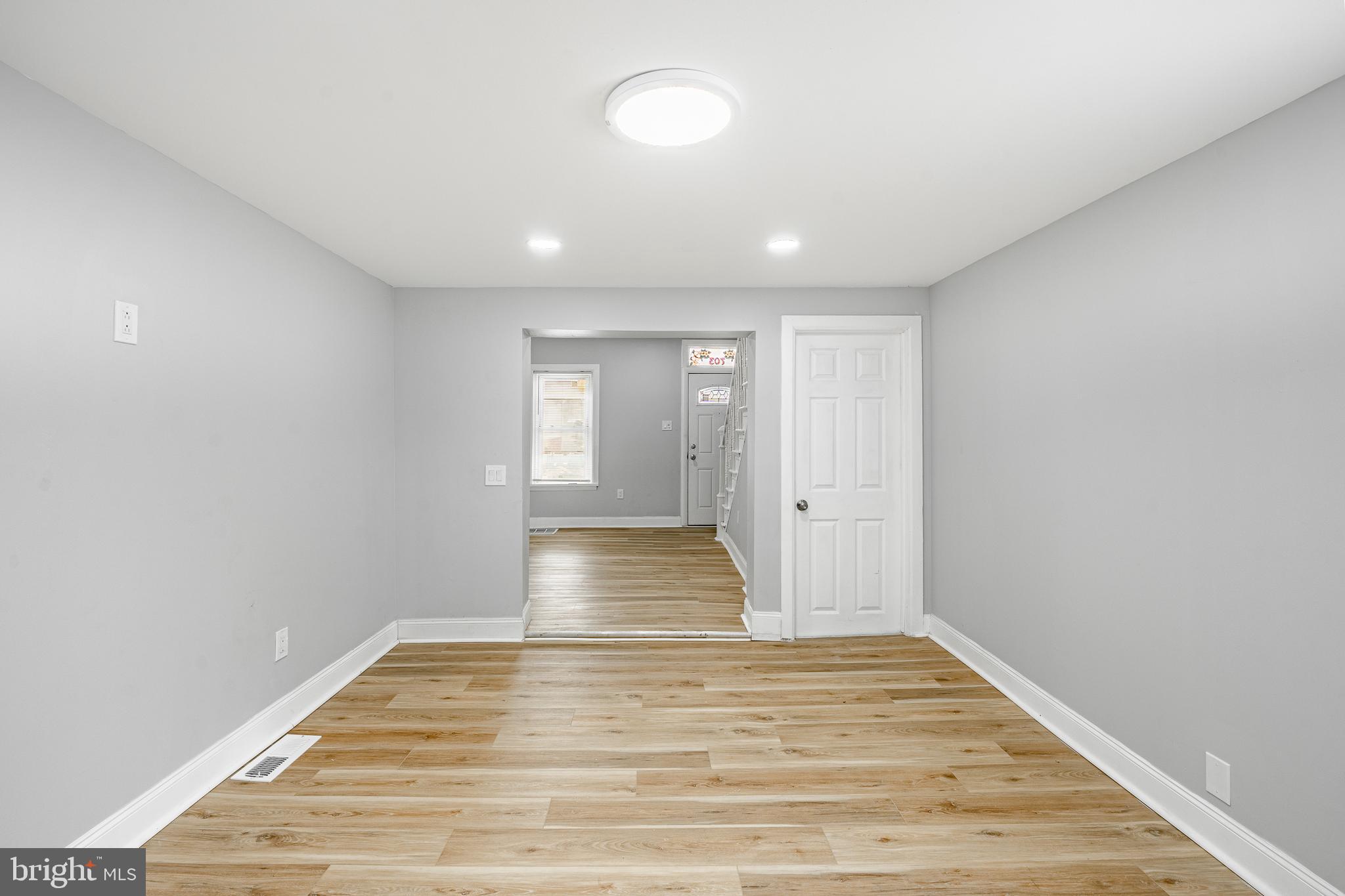 703 Walnut Street Pottstown, PA 19464 - Photo 7 of 24 wooden floor in an empty room