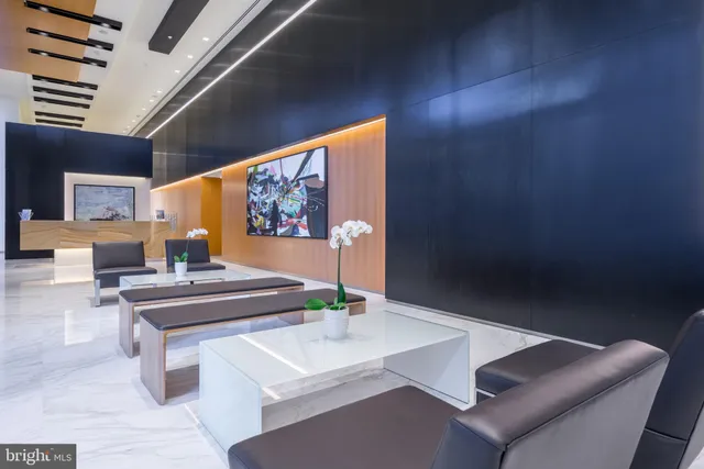 a room with chairs and tables