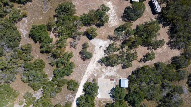 an aerial view of residential house with outdoor space