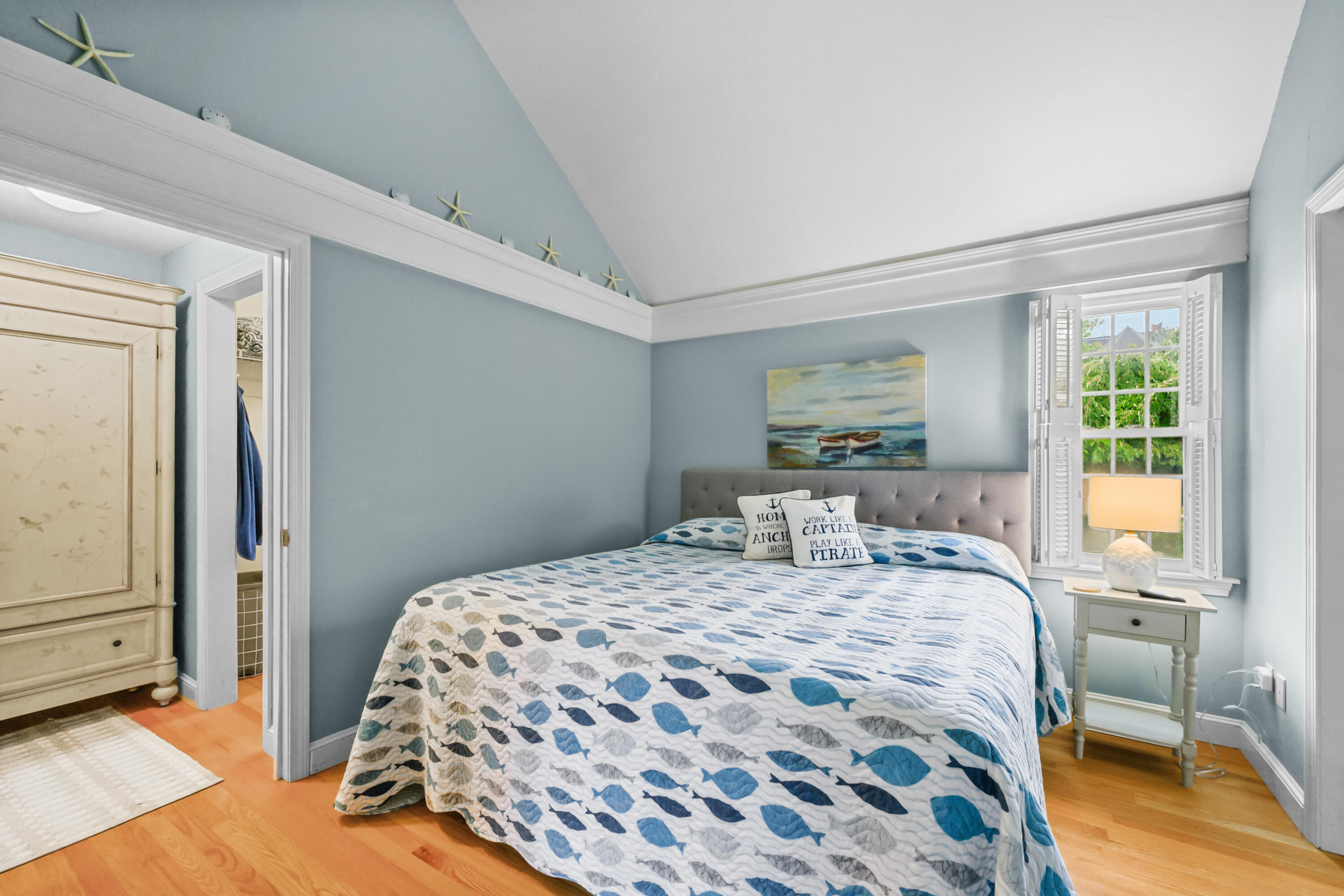 342 Sea Street Hyannis, MA 02601 - Photo 16 of 46 a bedroom with a bed and a window