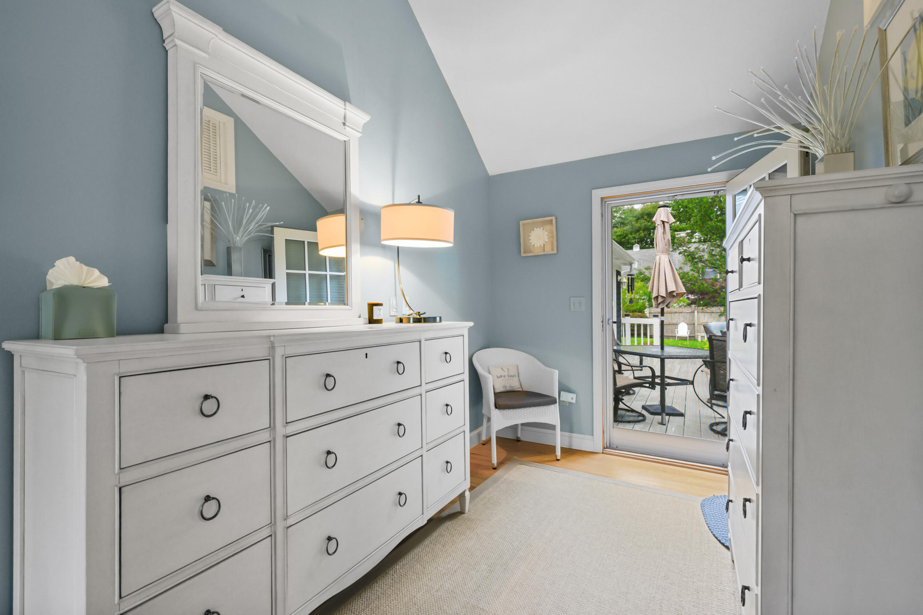 342 Sea Street Hyannis, MA 02601 - Photo 18 of 46 a bed room with a bed and a dresser