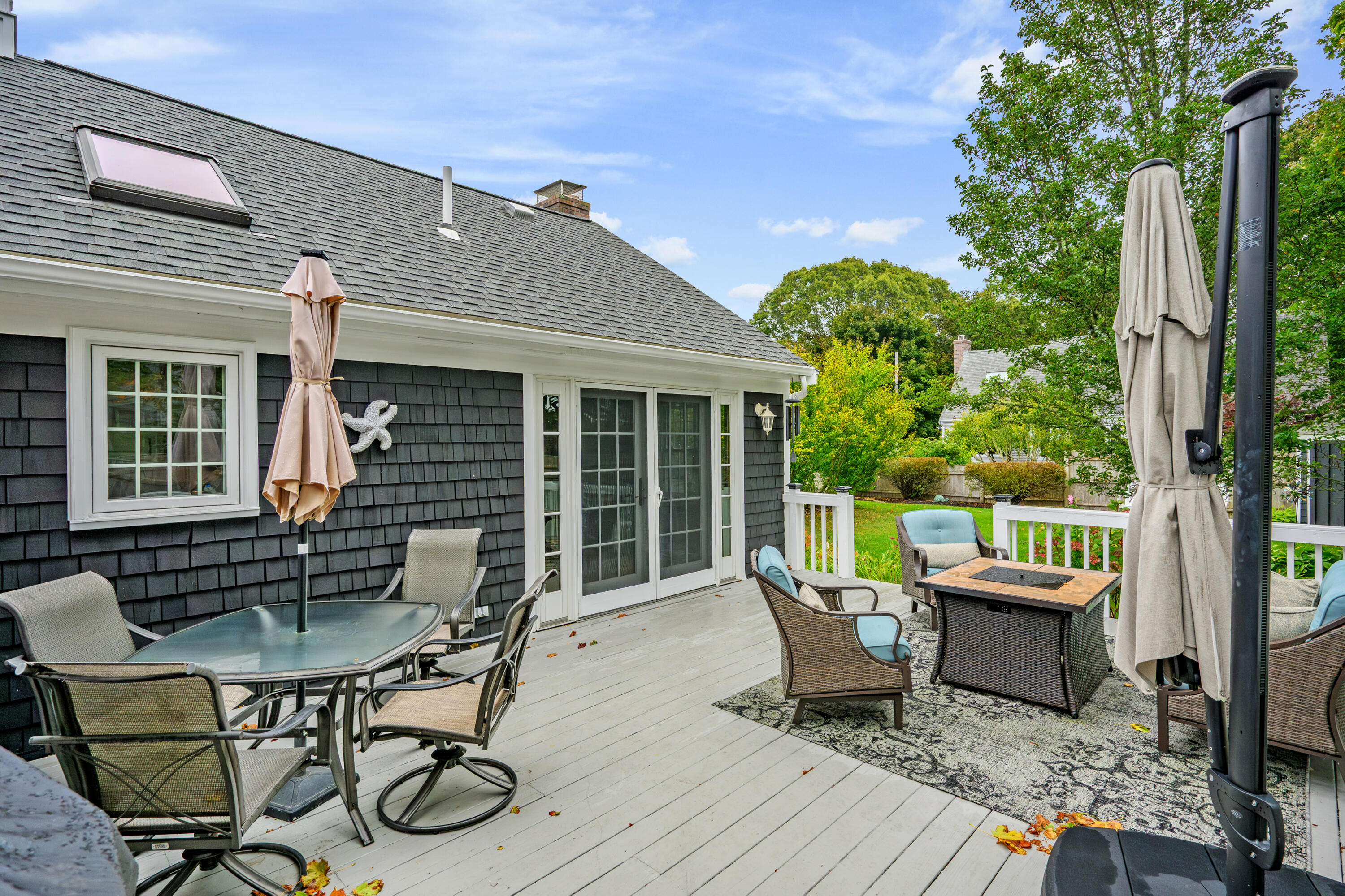 342 Sea Street Hyannis, MA 02601 - Photo 28 of 46 a view of a patio with couple of chairs