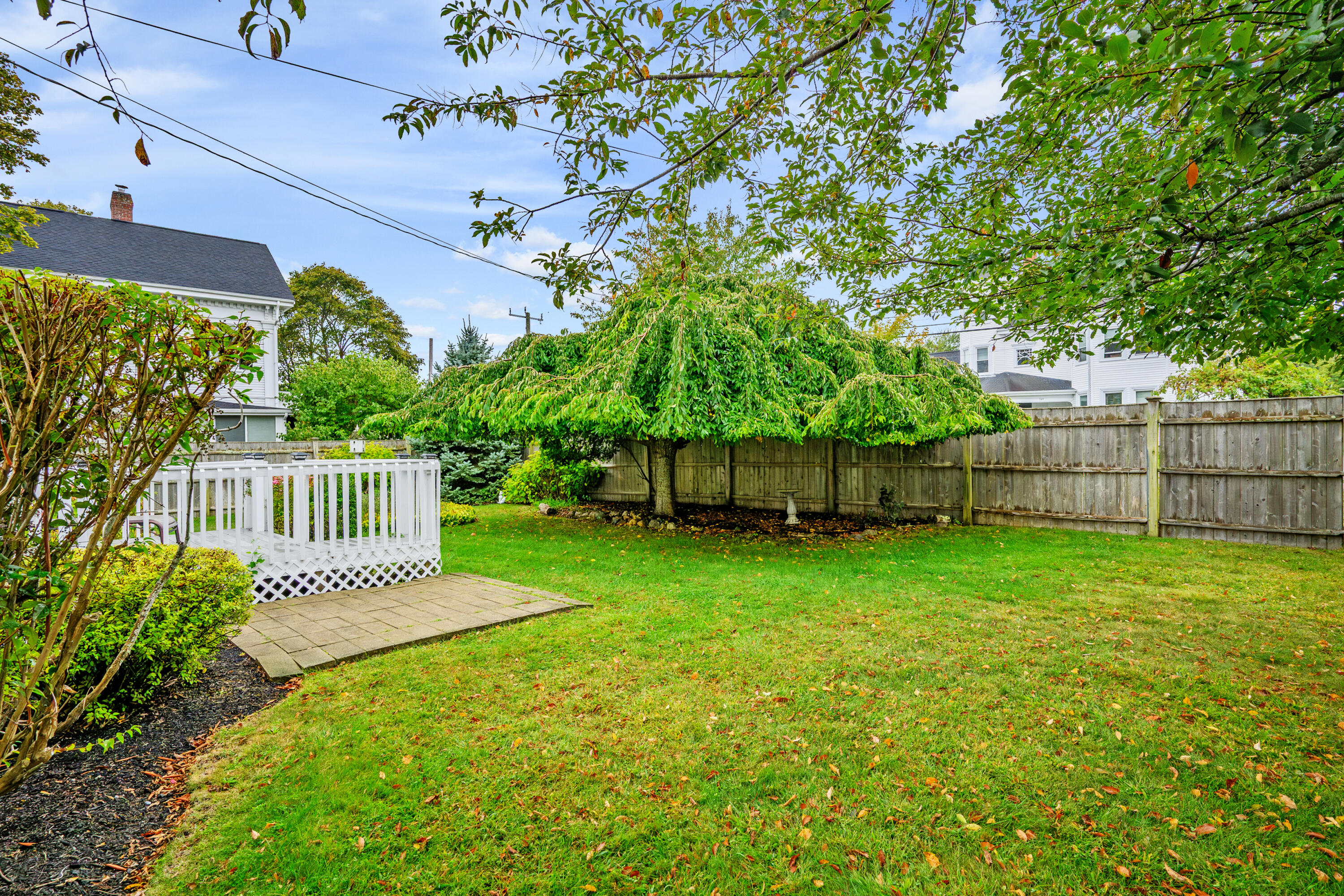 342 Sea Street Hyannis, MA 02601 - Photo 32 of 46 a view of a house with backyard and sitting area