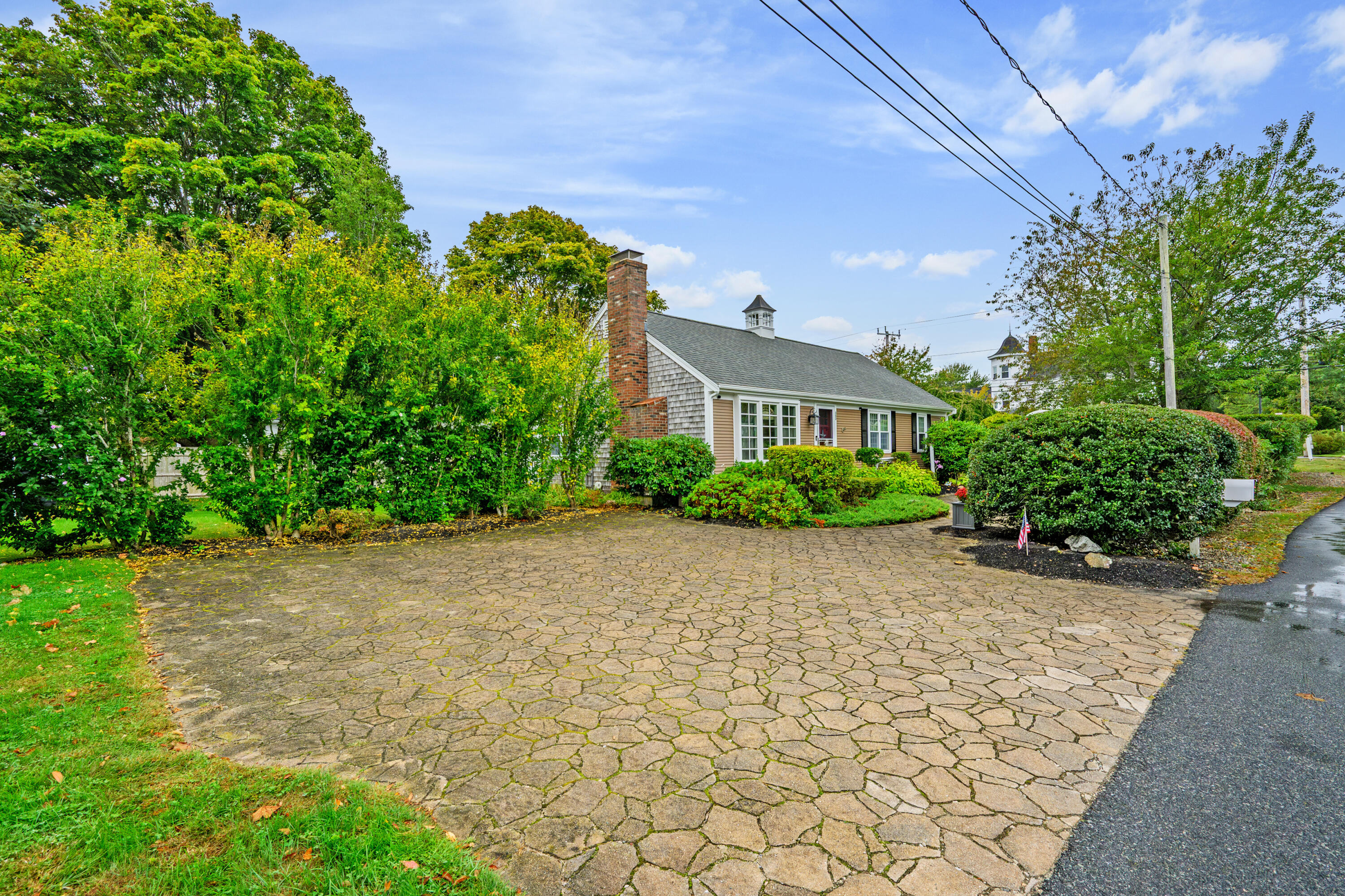342 Sea Street Hyannis, MA 02601 - Photo 44 of 46 a sidewalk with a building in the background