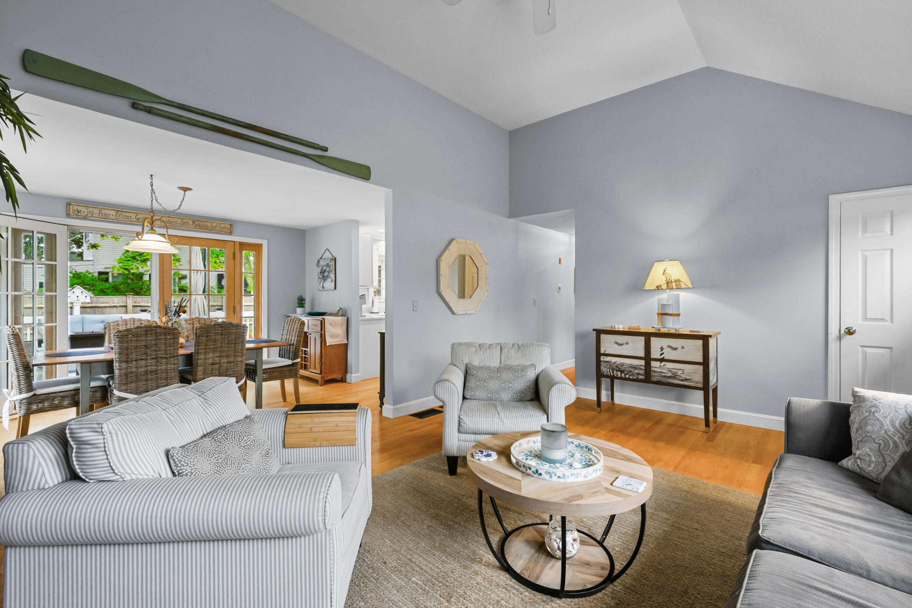 342 Sea Street Hyannis, MA 02601 - Photo 6 of 46 a living room with furniture and a lamp