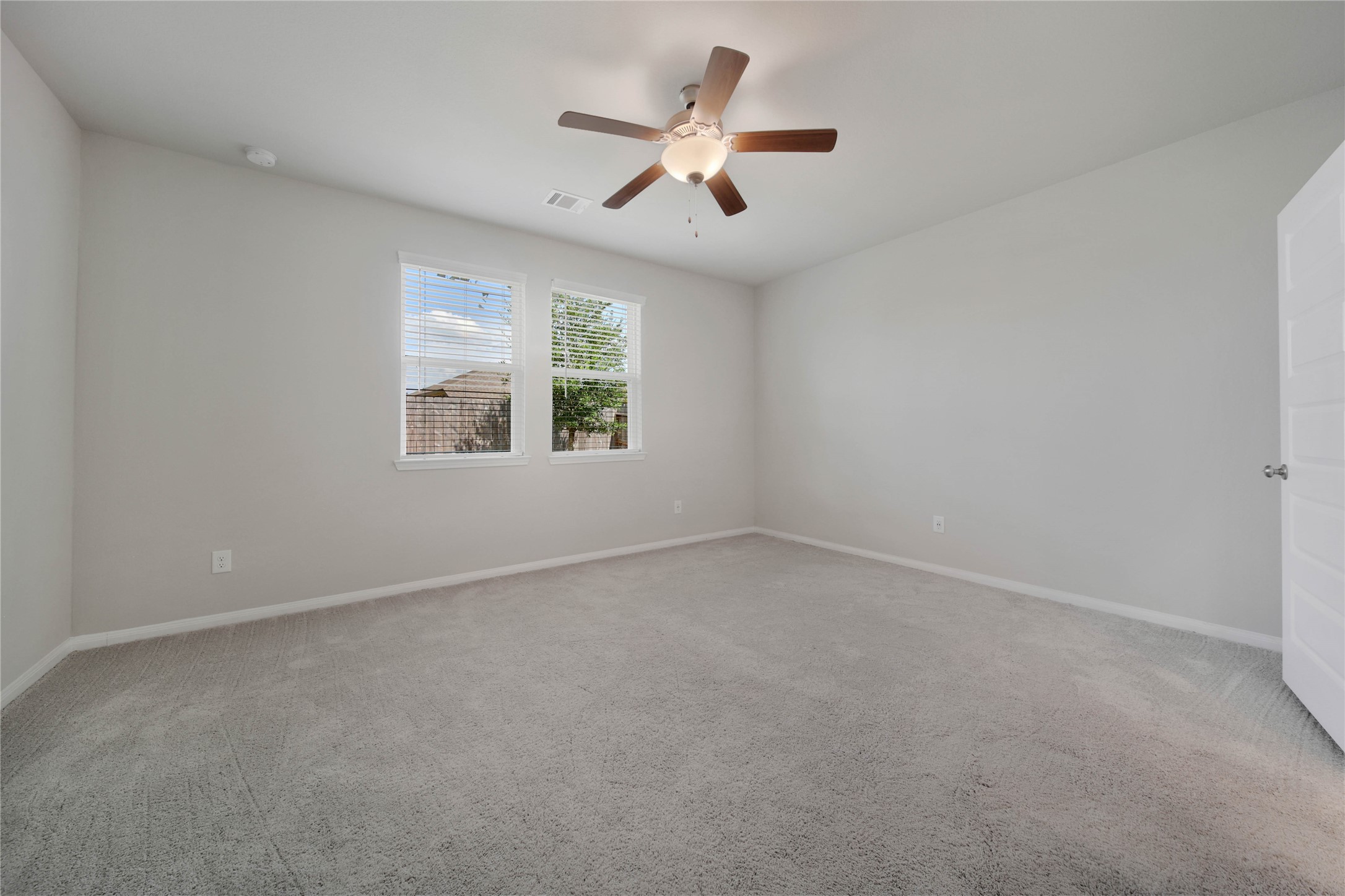 7080 Silverleaf Oak Street Conroe, TX 77304 - Photo 11 of 35 Located at the back of the home is the private owner’s suite. This large bedroom makes for easy furniture placement with room for the larger storage pieces that make life easier.