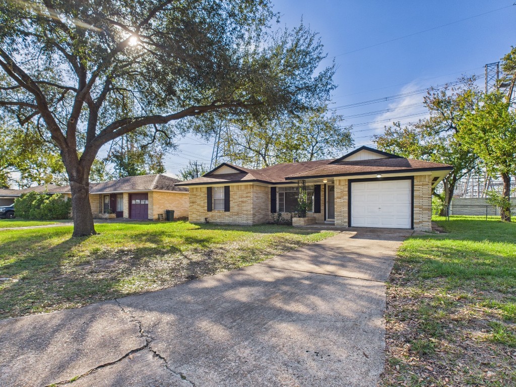 3035 Guese Road Houston, TX 77018 - Photo 18 of 20 a front view of a house with garden