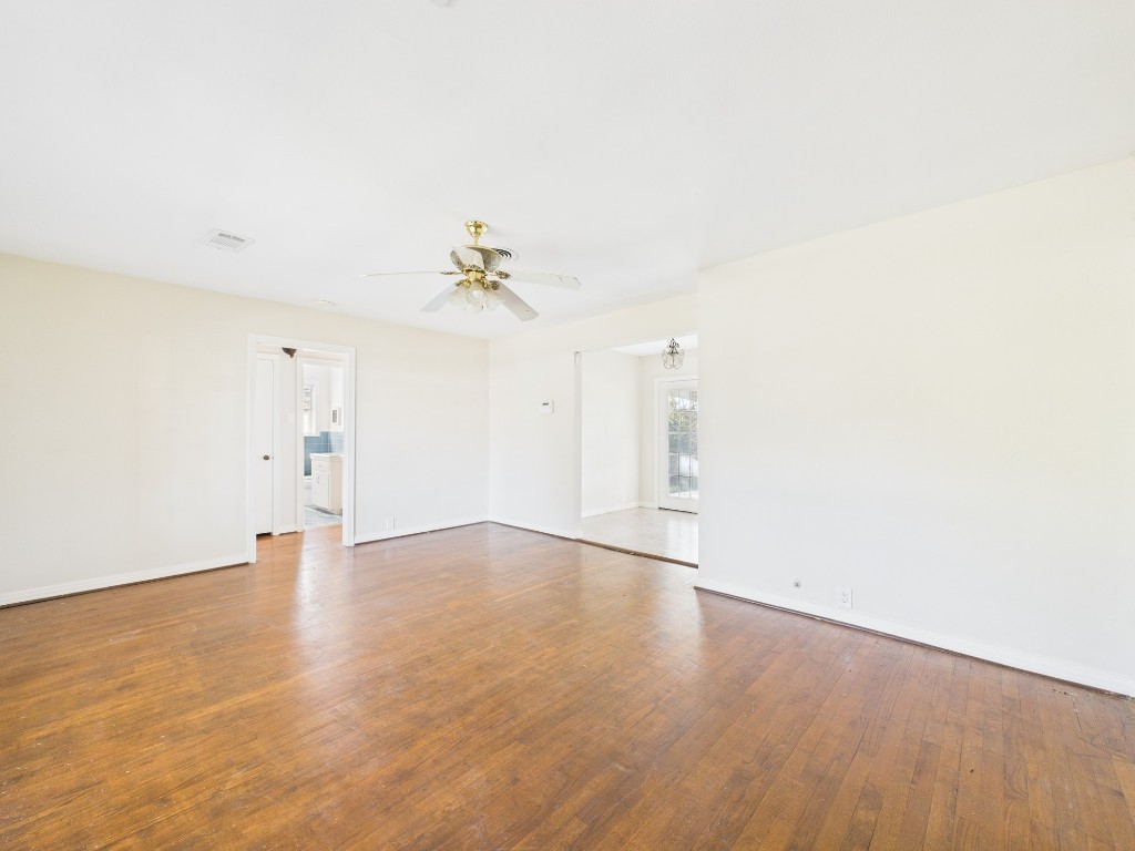 3035 Guese Road Houston, TX 77018 - Photo 4 of 20 a view of an empty room with wooden floor