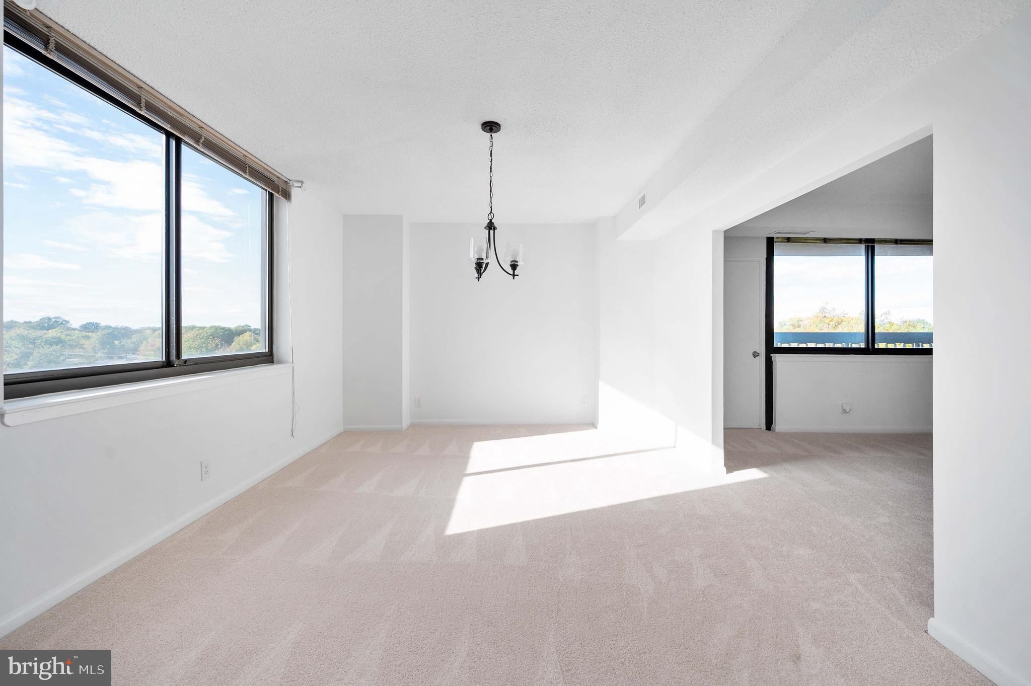 5501 Seminary Road, Unit 511S Falls Church, VA 22041 - Photo 12 of 44 an empty room with windows and entrance