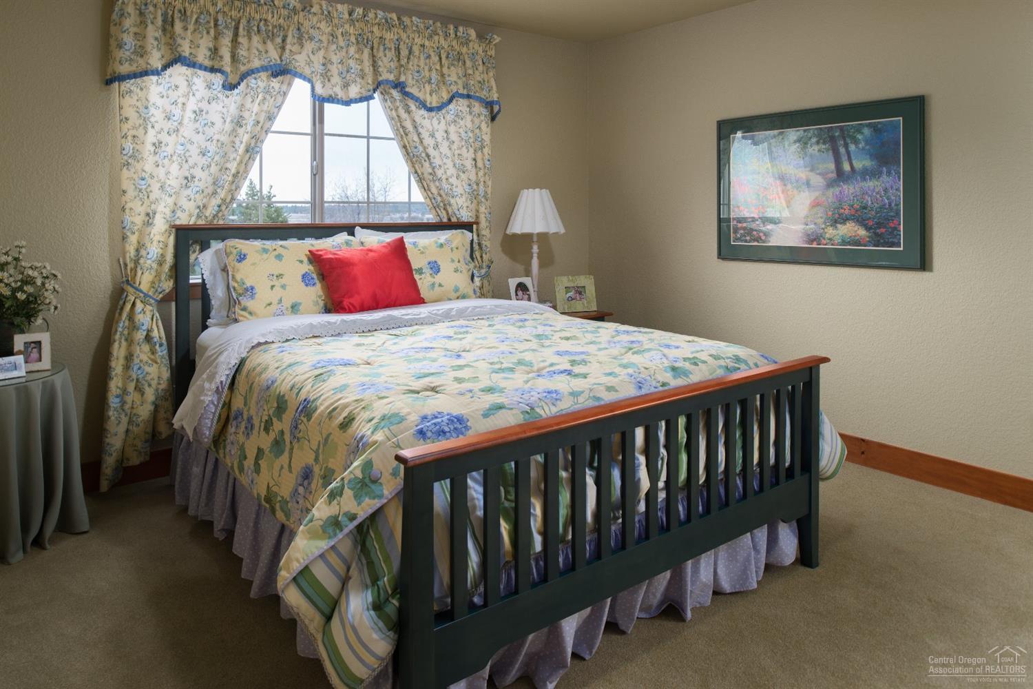 56902 River Road Sunriver, OR 97707 - Photo 18 of 24 This light and bright bedroom has a walk