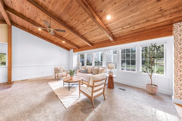 a outdoor space with lots of tables and chairs