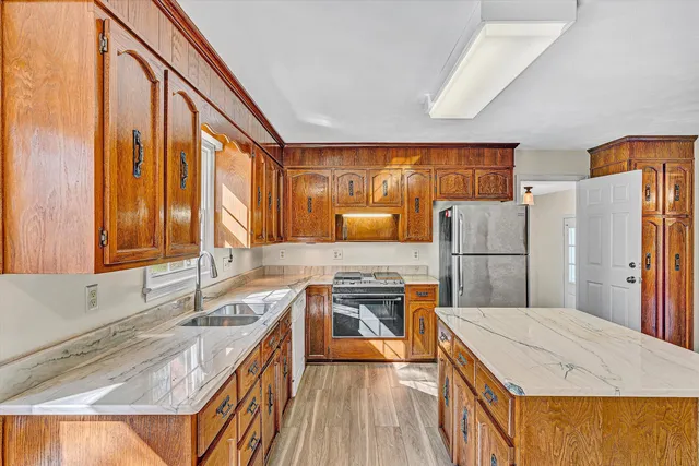 a view of a storage & utility room with two washing machine