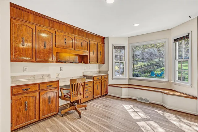 a view of an entryway with a hallway