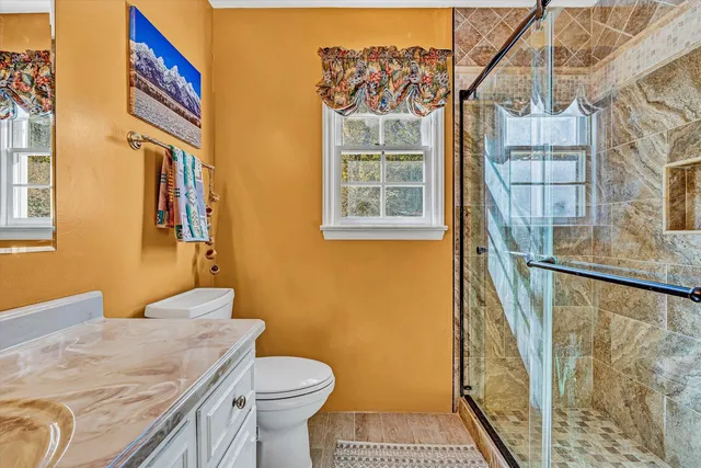 a view of an entryway with a hallway