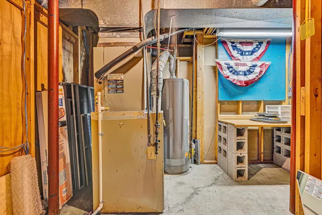 a view of a garden with a house in the background