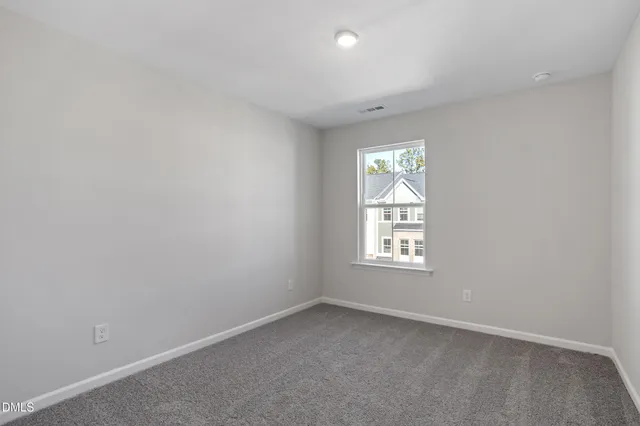 a bathroom with a sink double vanity and a mirror