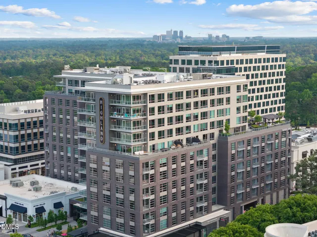 a view of a city with tall buildings