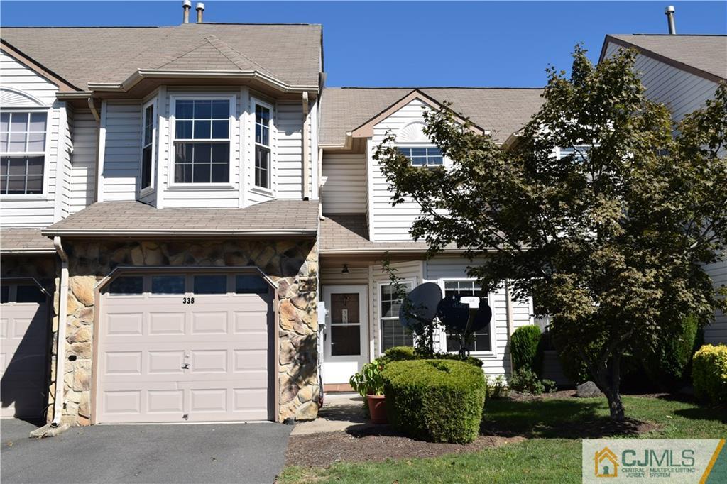 338 Lunar Road Piscataway, NJ 08854 - Photo 1 of 20 a front view of a house with a garden