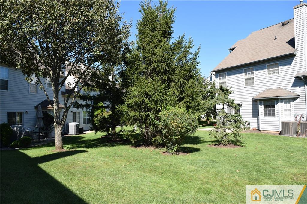 338 Lunar Road Piscataway, NJ 08854 - Photo 18 of 20 a view of a yard in front of a house