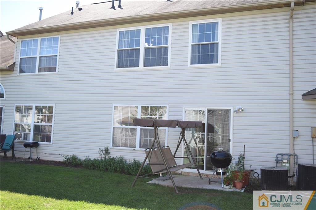 338 Lunar Road Piscataway, NJ 08854 - Photo 19 of 20 a front view of a house with a yard