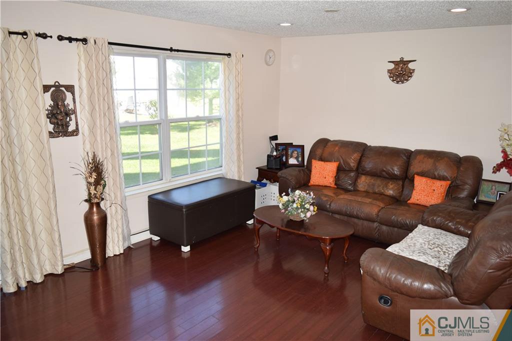 338 Lunar Road Piscataway, NJ 08854 - Photo 6 of 20 a living room with furniture and a window
