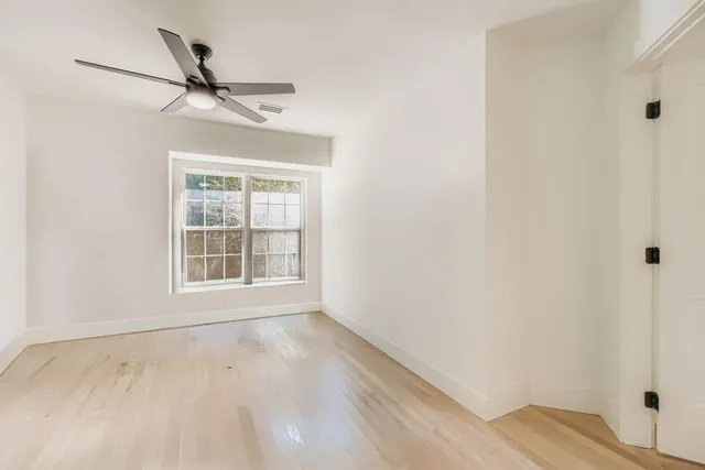 a bathroom with a toilet and a bathtub