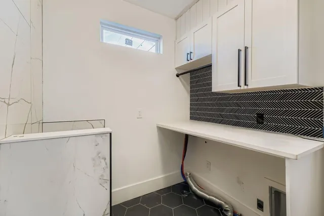 a view of a porch with wooden floor