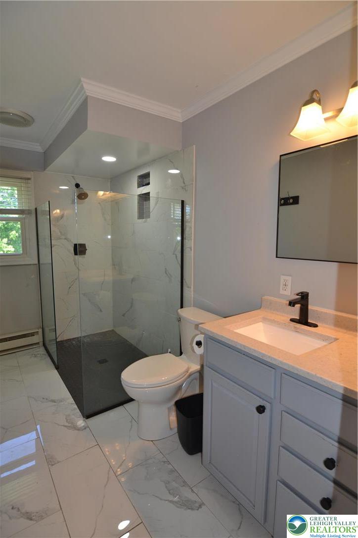 3071 Athena Drive Bethlehem, PA 18017 - Photo 17 of 27 a bathroom with a sink a toilet and shower