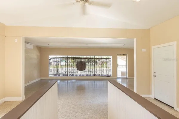 a view of an entryway with a window