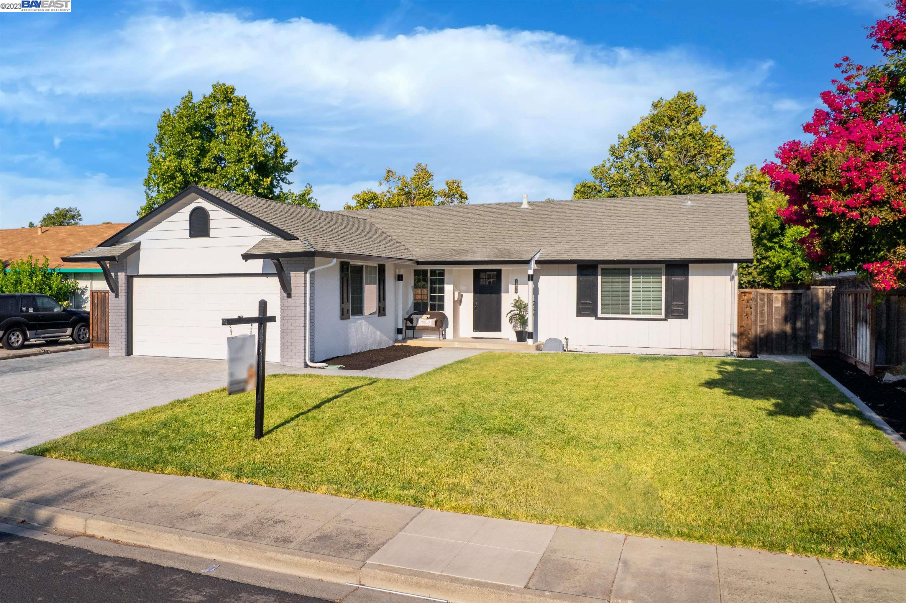 1215 Lakehurst Road Livermore, CA 94551 - Photo 1 of 1 a front view of a house with garden