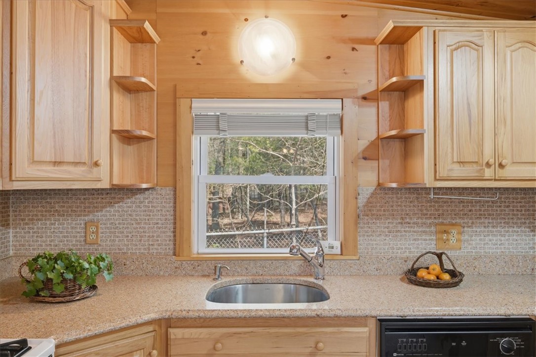 2 Michelle Lane Charlestown, RI 02813 - Photo 22 of 43 Tile backsplash. All the windows have blinds.