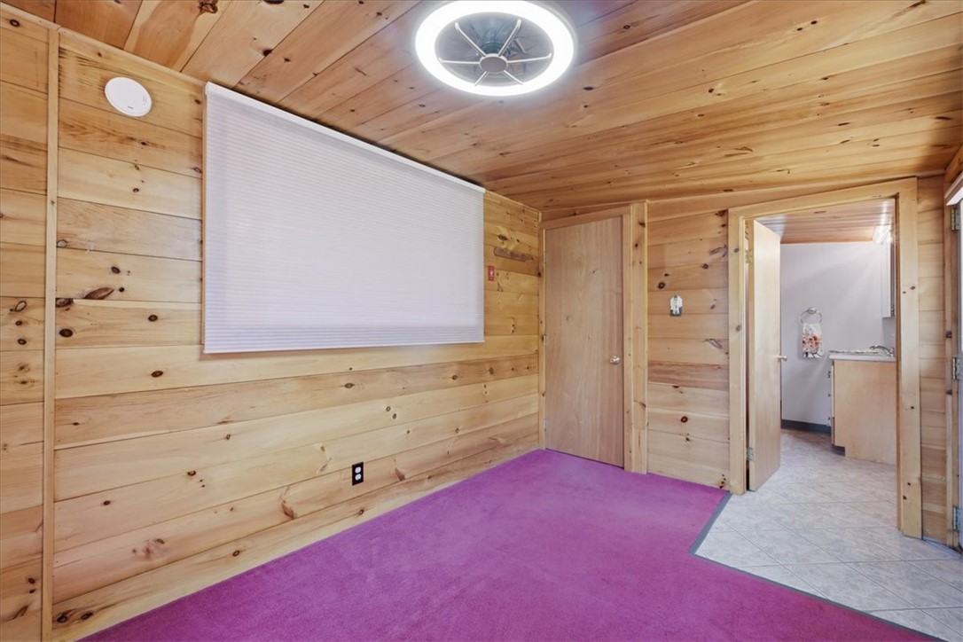 2 Michelle Lane Charlestown, RI 02813 - Photo 27 of 43 Bedroom with door to full bath and blind closed between livingroom and bedroom