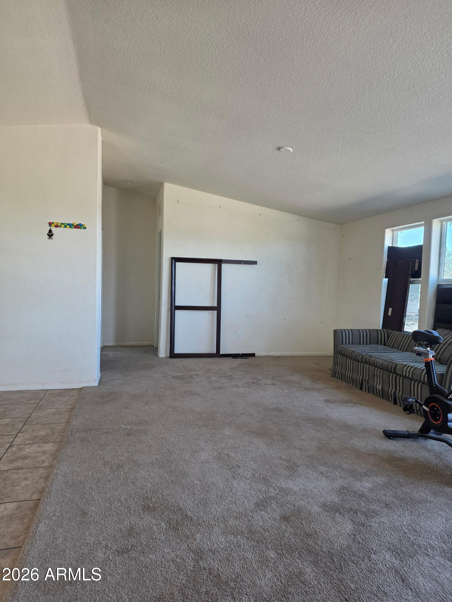 51713 West Fresno Road Maricopa, AZ 85139 - Photo 7 of 9 a view of an empty room