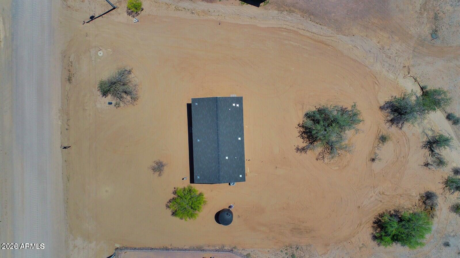 51713 West Fresno Road Maricopa, AZ 85139 - Photo 9 of 9 view of a utility room with a potted plant