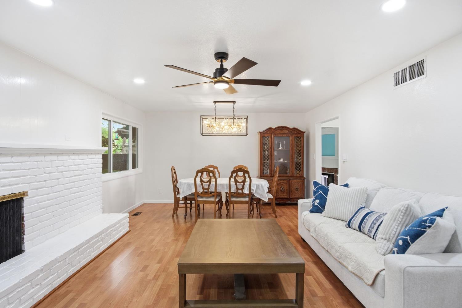 3501 North Avenue Modesto, CA 95358 - Photo 16 of 44 a living room with furniture and wooden floor
