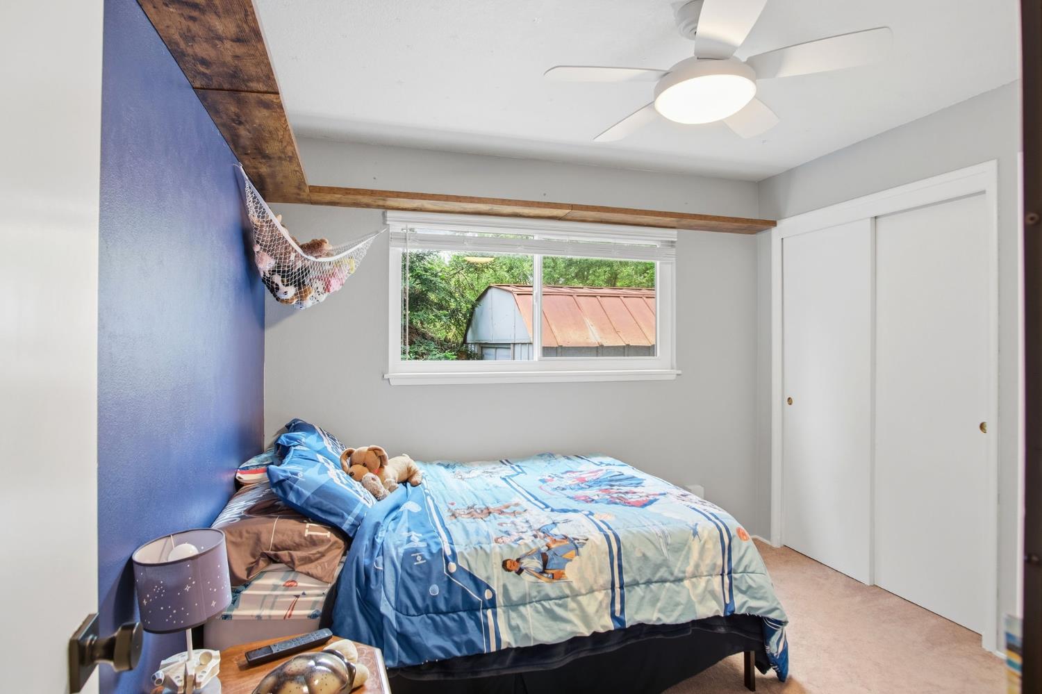 3501 North Avenue Modesto, CA 95358 - Photo 21 of 44 a bedroom with a bed and a window