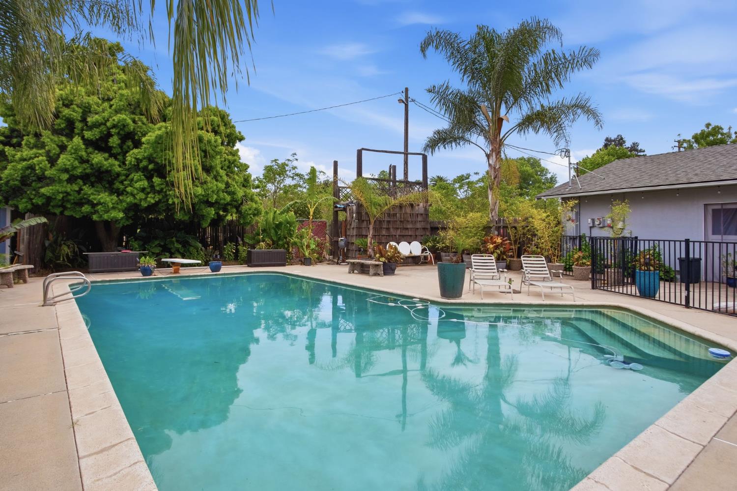 3501 North Avenue Modesto, CA 95358 - Photo 29 of 44 a view of a swimming pool with a patio