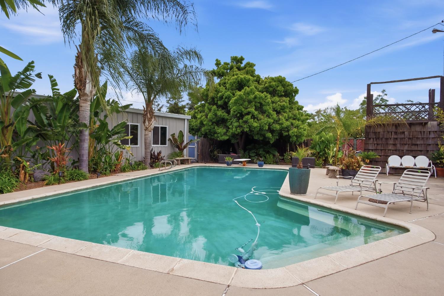 3501 North Avenue Modesto, CA 95358 - Photo 30 of 44 a view of a house with swimming pool