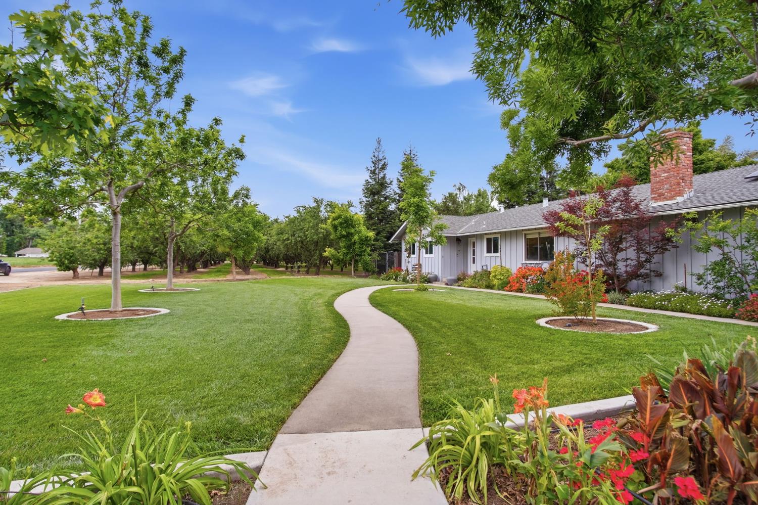 3501 North Avenue Modesto, CA 95358 - Photo 4 of 44 a front view of a house with garden