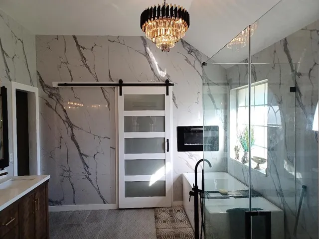 a view of entryway and kitchen