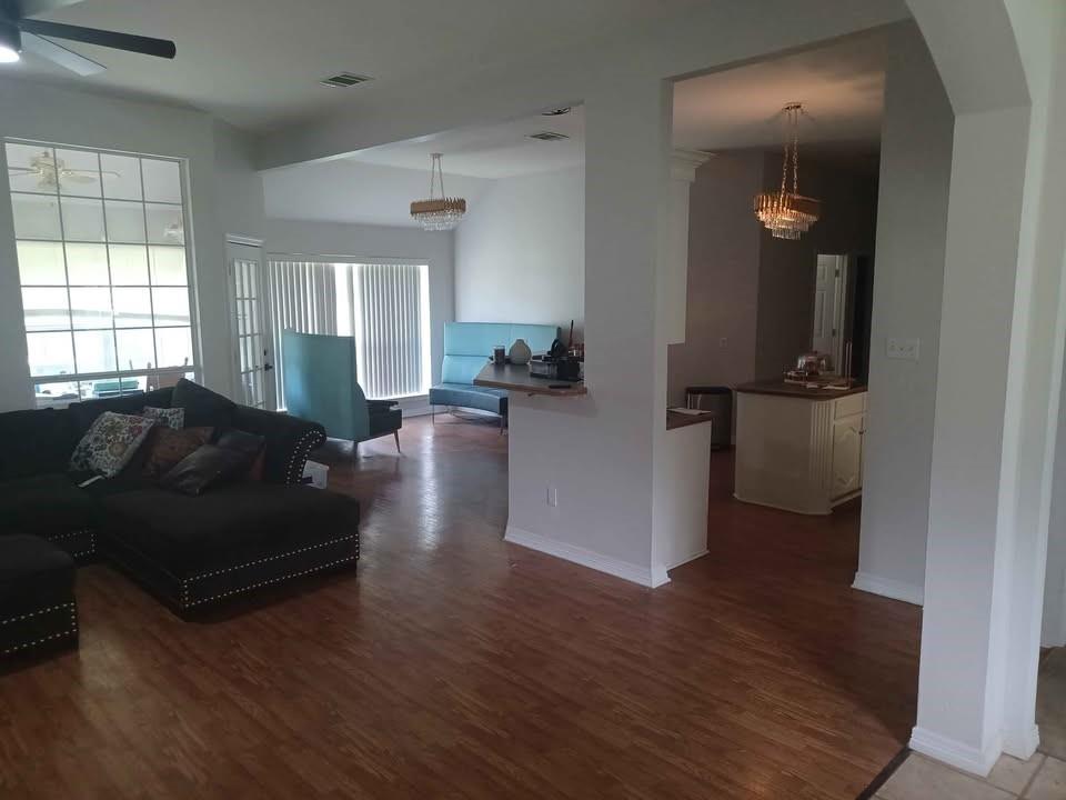 109 Cole Road Red Oak, TX 75154 - Photo 14 of 39 a living room with furniture and a wooden floor
