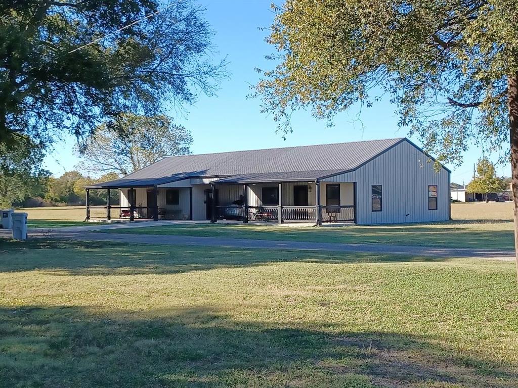 109 Cole Road Red Oak, TX 75154 - Photo 17 of 39 a front view of a house with a yard